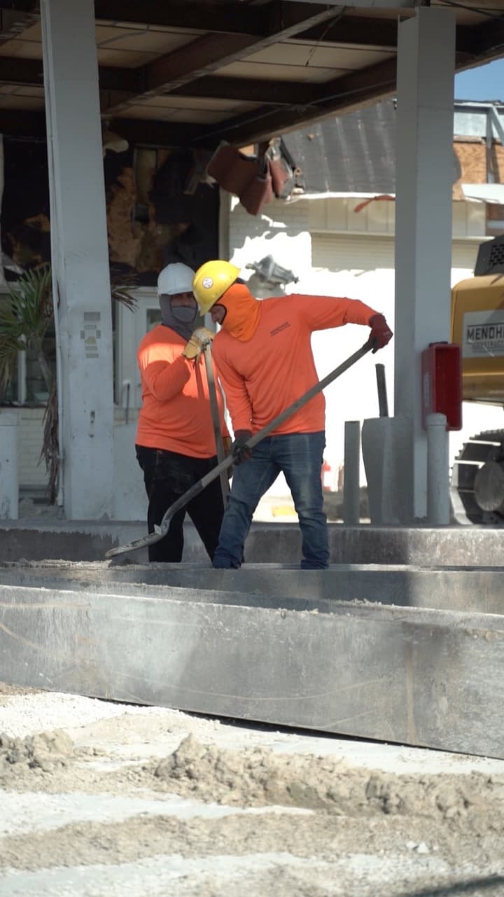 A construction crew at work on a jobsite, filmed by BTO
